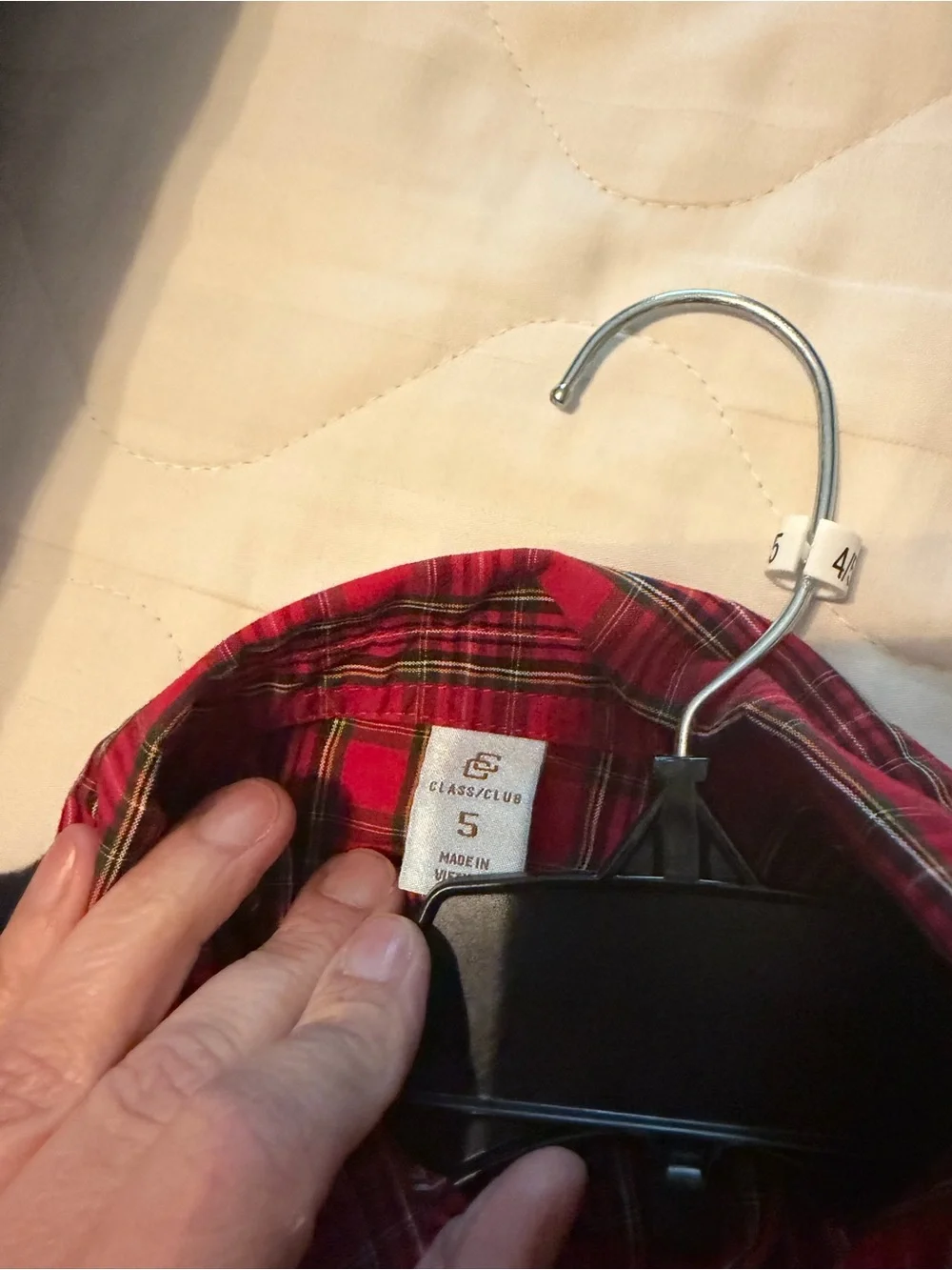 Two shirts, two sweater and a pair of cords